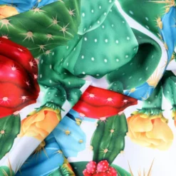 Tovaglia Antimacchia Hydro Cactus Disegno 3 Cactus su fondo azzurro con fiori gialli e rossi 140 x 300